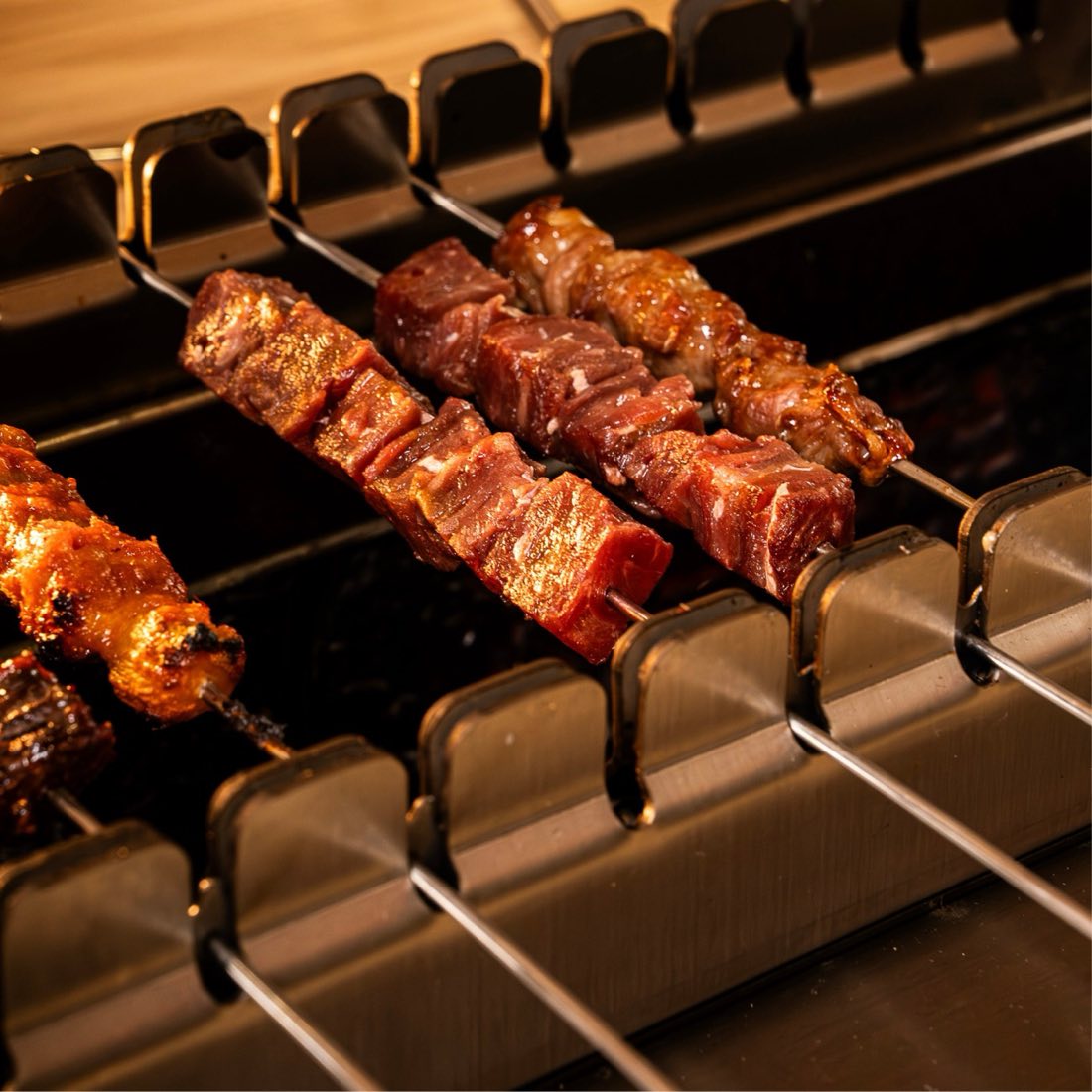 Skewers over open flame